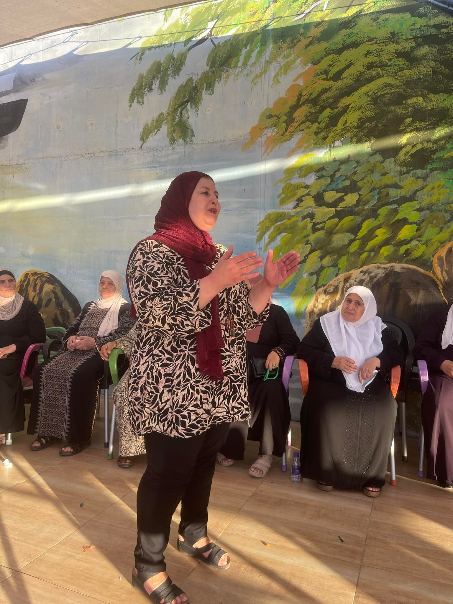 The People's Committee for Jenin Camp Services and the Lest We Forget Association are implementing an entertainment day for elderly women in Jenin camp